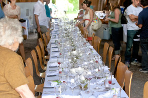 The first guest begin to take their seats